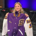 Photo courtesy Sarah Campbell
Sequim High School junior Riley Campbell received a Letterman jacket on Nov. 9 for her years of service volunteering with the Wolf Pack youth football and cheer program. She started in the organization in kindergarten.