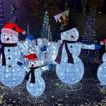 Photo courtesy Captain Crystal Stout/ This snowman family lights up in 1st Security Bank as part of volunteers efforts to decorate downtown Sequim.