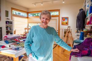 Sequim Gazette photos by Emily Matthiessen
Lynn Baritelle, pictured in her studio, is a weaver and fiber artist with more than 5 decades of experience. Her guild, the North Olympic Shuttle and Spindle Guild, will hold their textile sale, Celebrating Color, at Megan Cyphers Locally Known Cowork, 112 W. Washington Street in Sequim on Dec. 6 and 7.