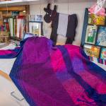 Sequim Gazette photo by Emily Matthiessen/ This scarf by Lynn Baritelle, master weaver, is one of the many items for sale at the upcoming textile sale, Celebrating Color, put on by the North Olympic Shuttle and Spindle Guild on Dec. 6 and 7 at Megan Cyphers Locally Known Cowork, 112 W. Washington Street in Sequim on Dec. 6 and 7.