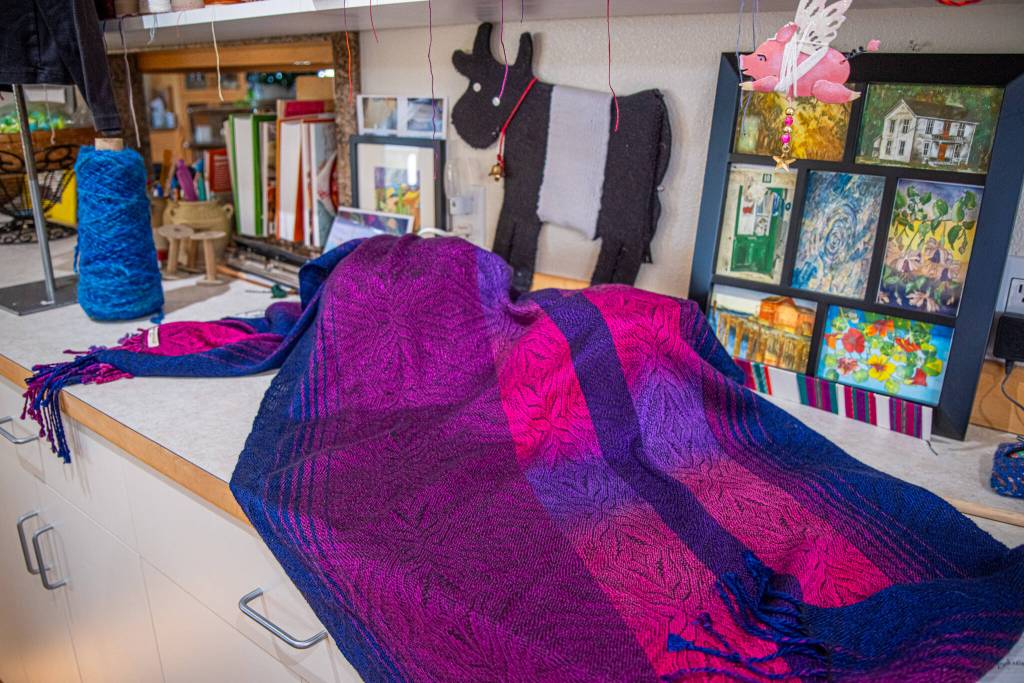 Sequim Gazette photo by Emily Matthiessen/ This scarf by Lynn Baritelle, master weaver, is one of the many items for sale at the upcoming textile sale, Celebrating Color, put on by the North Olympic Shuttle and Spindle Guild on Dec. 6 and 7 at Megan Cyphers Locally Known Cowork, 112 W. Washington Street in Sequim on Dec. 6 and 7.