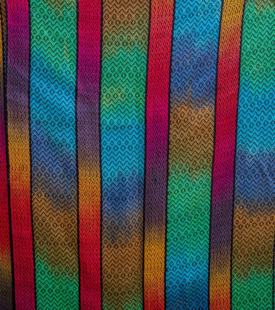 Sequim Gazette photo by Emily Matthiessen/ An example of the work of master weaver Lynn Baritelle, who also dyes and spins fiber to produce thread for her weavings. The luminous color, soft texture and intricacy of pattern can only be hinted at in a photograph.