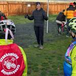 Sequim Gazette photo by Matthew Nash/ Tom Coonelly, co-organizer of Sequims Cranksgiving, speaks to participants in the annual bike ride benefit for Sequim Food Bank on Nov. 23. This years event had 40 cyclists participate.