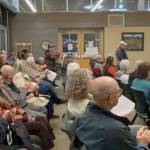 Sequim Gazette photo by Matthew Nash
Residents of various manufactured home parks applaud the Sequim city councils decision on Dec. 9 to approve a new overlay that preserves manufactured home parks so that they cannot be redeveloped for other uses.