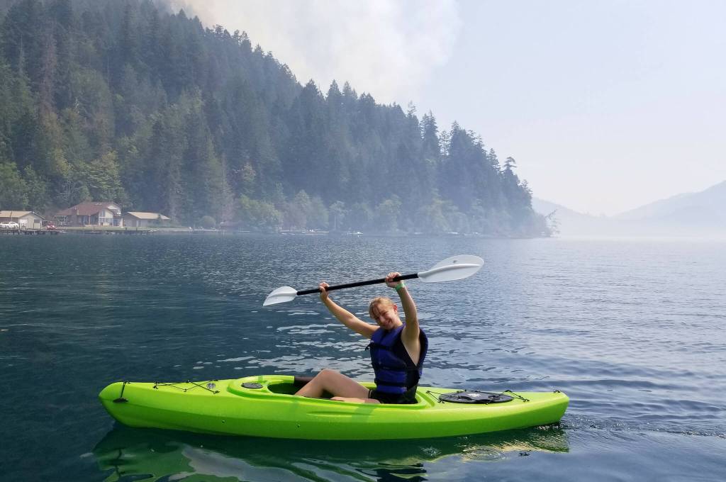 Photo courtesy Peter Craig/ Grace Kathol enjoys checking off requirements for the kayaking merit badge in Lake Crescent during her scouting time.