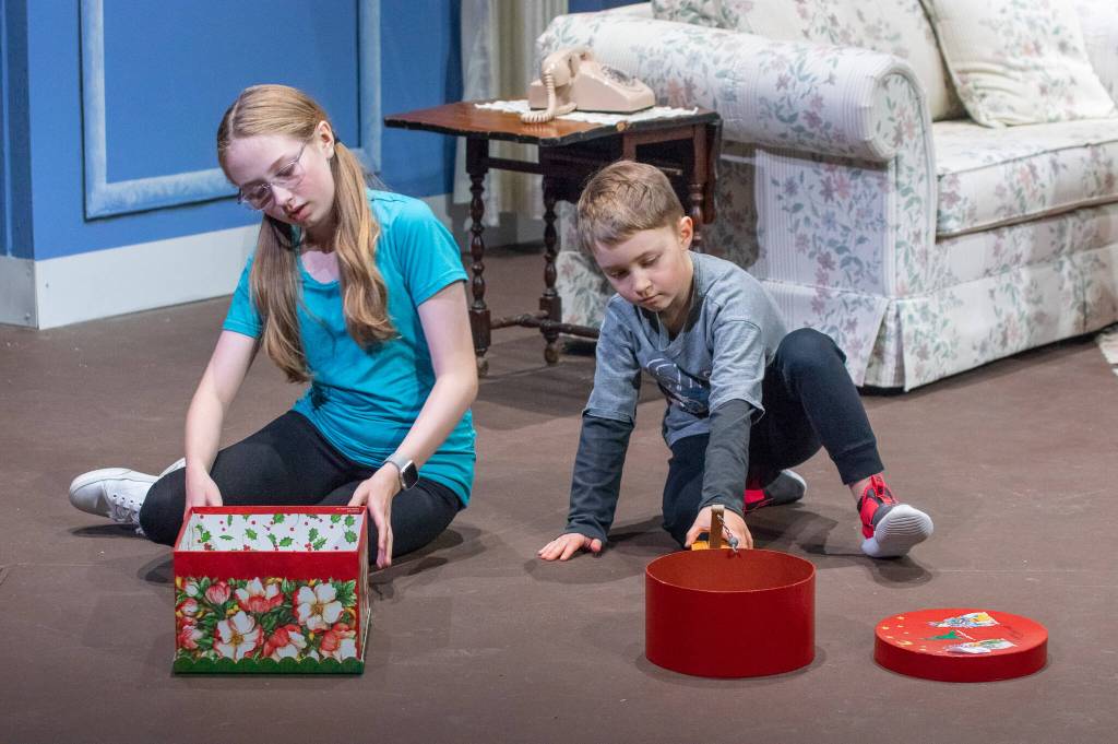Sequim Gazette Photo by Emily Matthiessen/ Trinity Devlin and Liam Patterson play orphans in OTA's upcoming production, "The Rented Christmas," directed by Christy Holy.