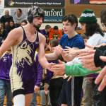 Sequim Gazette file photo by Michael Dashiell 
Sequims Jayms Vilona gets congratulated by teammates after a win over his Bremerton foe on Jan. 10. Hes one of the upperclassmen wrestlers anticipated to a make a continued leap forward, said new head coach Tyler Izatt.