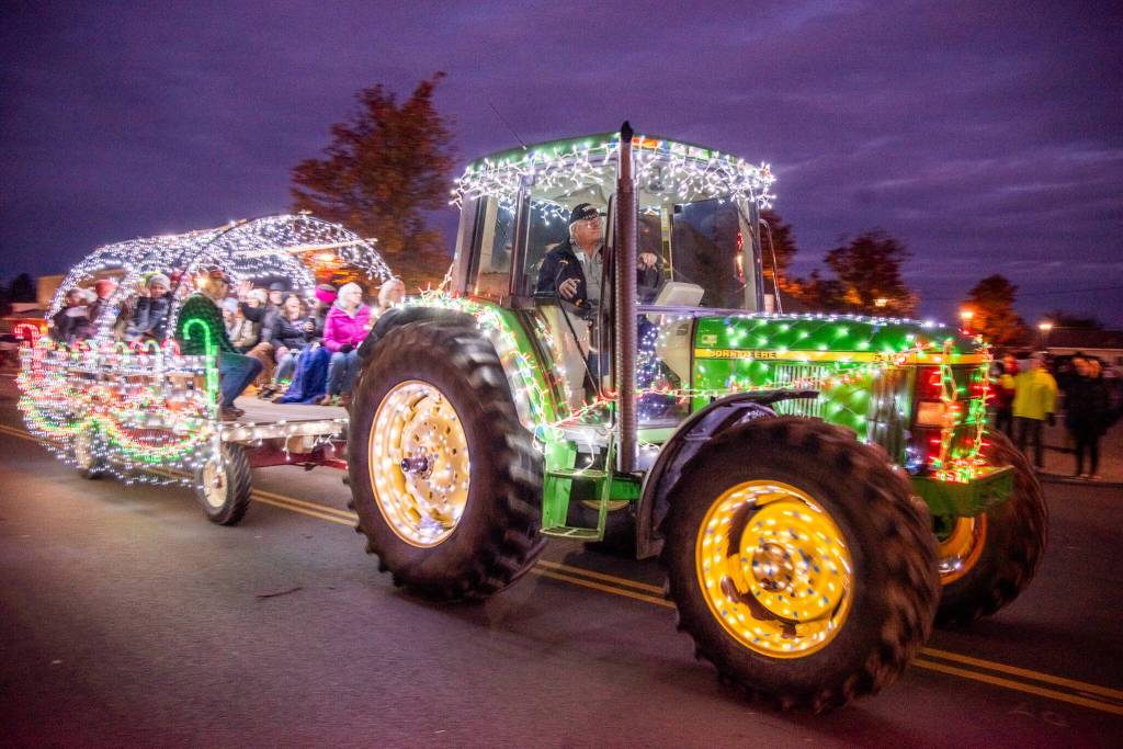 Sequim Gazette photo by Emily Matthiessen/ This year's tractor cruise in Sequim was a big success, with crowds lining Sequim Ave and Washington St.
