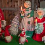 Sequim Gazette photo by Emily Matthiessen/ Animatronic Mrs. Clauses surrounded by Tomtens greet customers in the Lazy J Christmas Barn. Every year a different selection of gently used Christmas items are offered, as well as tree stands and produce and apple cider.