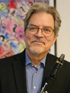 The Sequim City Band presents some of A.C. – The Man Who Saved Christmas, a musical inspired by the life of A.C. Gilbert on Dec. 22nd. It was co-written by Vincent Oneppo, pictured, and Jay Gitlin. A full production has yet to be staged, but Oneppo, principal clarinetist with the City Band, has re-arranged several of these selections for the ensemble.