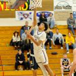 Sequim Gazette photo by Matthew Nash
Solomon Sheppard goes in for a layup to score two of his game-high 23 points on Dec. 13 against Bainbridge.