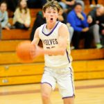 Sequim Gazette photo by Matthew Nash/ Mason Rapelje looks to pass against Bainbridge in a 69-44 home win.