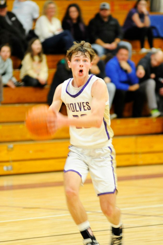 Sequim Gazette photo by Matthew Nash/ Mason Rapelje looks to pass against Bainbridge in a 69-44 home win.