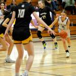 Sequim Gazette photo by Matthew Nash/ Sequims Kylie Winter drives up court on Dec. 13 against Bainbridge.