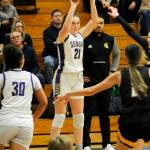 Sequim Gazette photo by Matthew Nash/ Libby Turella goes up for a 3-pointer against Bainbridge on Dec. 13.