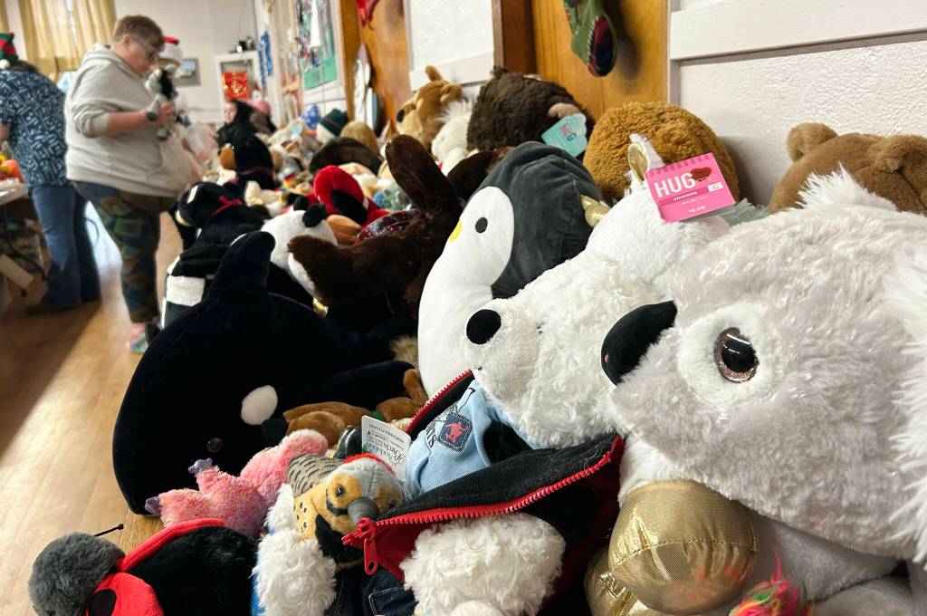 Sequim Gazette photo by Matthew Nash/ Each child receives a stuffed animal through Sequim Community Aids Toys for Sequim Kids.
