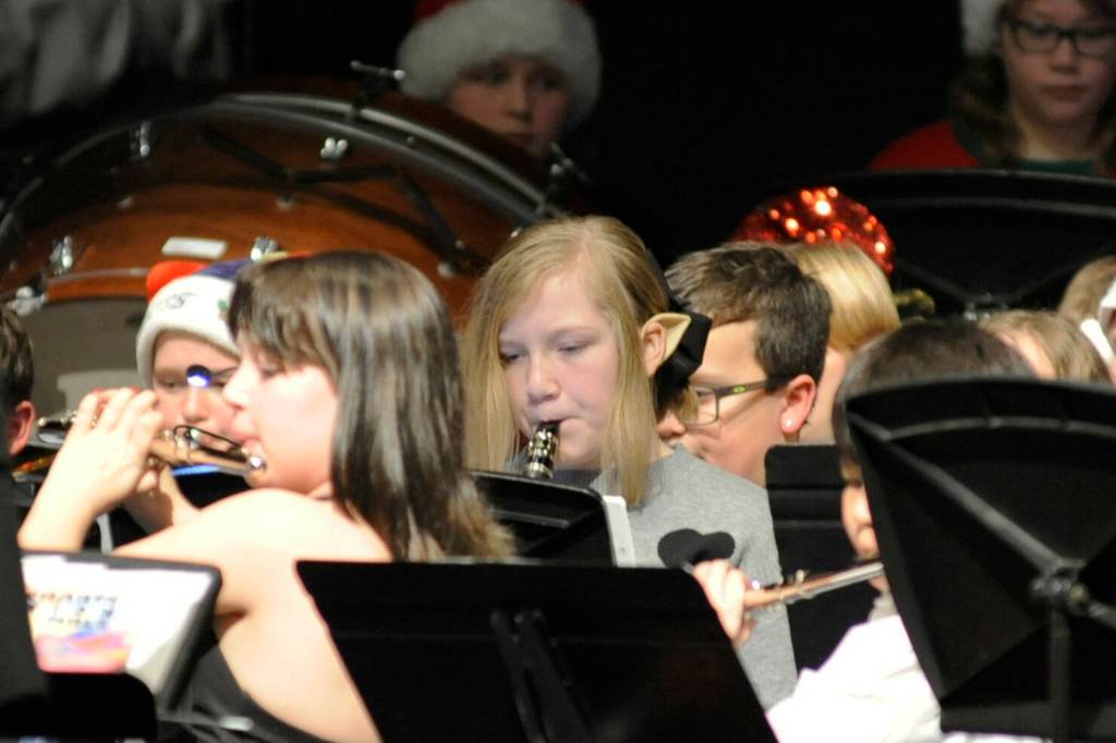 Sequim Gazette photo by Matthew Nash/ Students at the Sequim All Bands Concert on Dec. 19 wore festive outfits, hats and ears, including sixth grader Chloe Piceno.