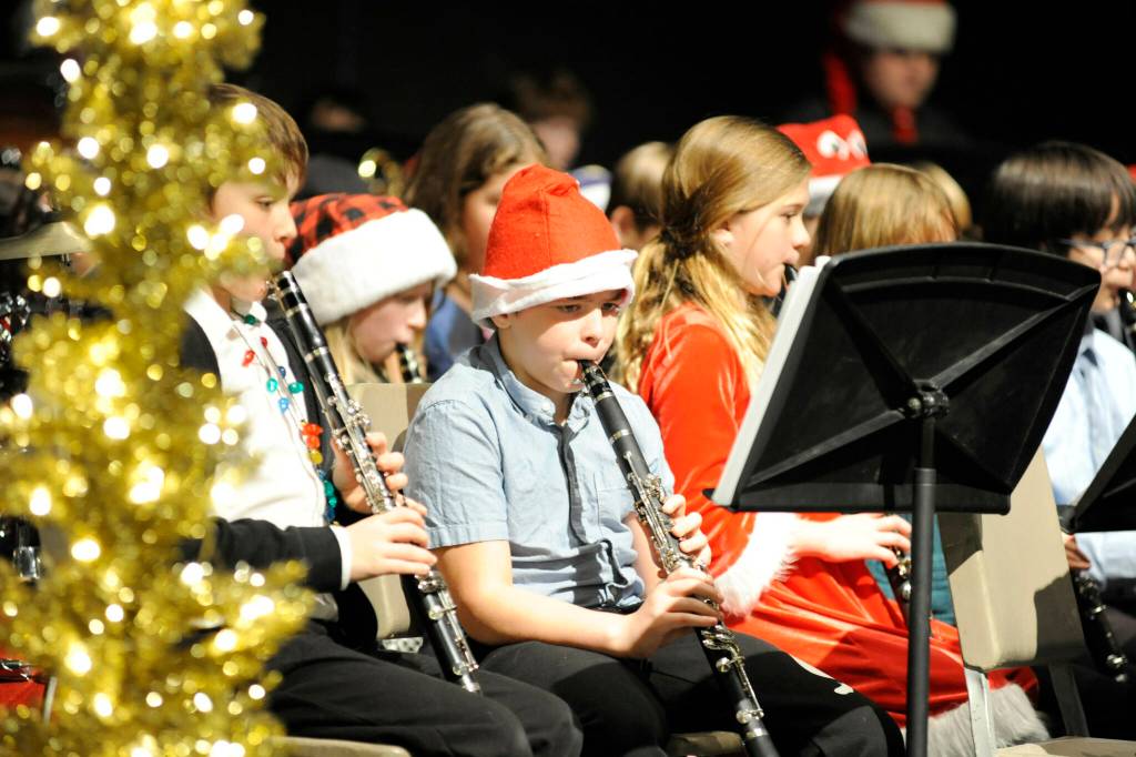 Sequim Gazette photo by Matthew Nash/ Sixth grader Joey Hansen plays with fellow students in the Sequim Middle School Beginner Band and Helen Haller fifth grade Cougar Band. They played a number of songs including Hard Rock Blues.