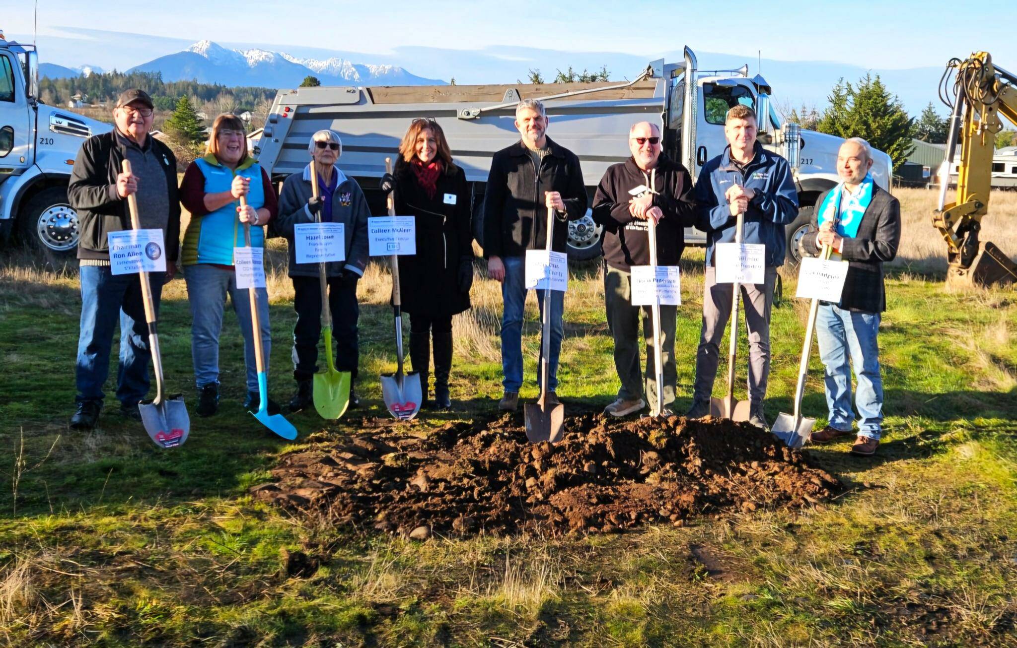 Photo courtesy Habitat for Humanity of Clallam County
Stakeholders and community leaders stand together for the ceremonial groundbreaking of Habitat for Humanity of Clallam Countys Lyons Landing property in Carlsborg on Dec. 23.