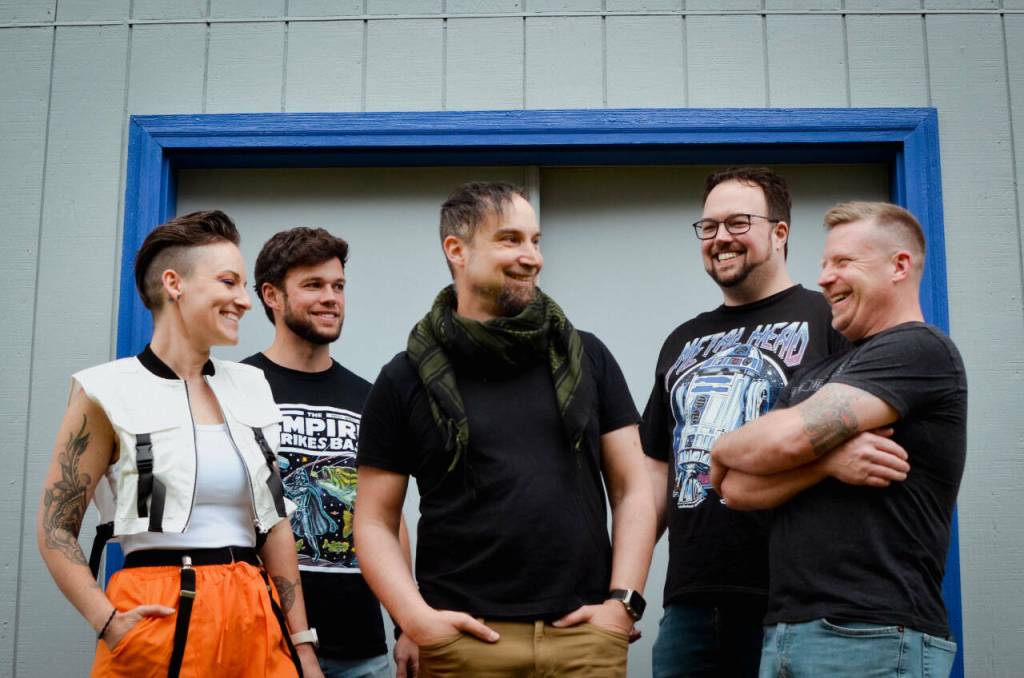 Sequim Gazette photo by Elijah Sussman 
SuperNostalgic, from left, Sadie Sprenger, Adam Bettger, Jeremy Pederson, Branden Bettger, and Michael Echternkamp stand together before the May 4 show at Sequims Elks Club.