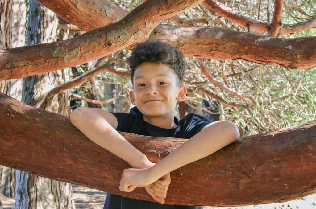Sequim Gazette photo by Elijah Sussman 
Writer Anderson Williams at Carrie Blake Park on June 6. He was interviewed after winning a North Olympic Library System writing contest.