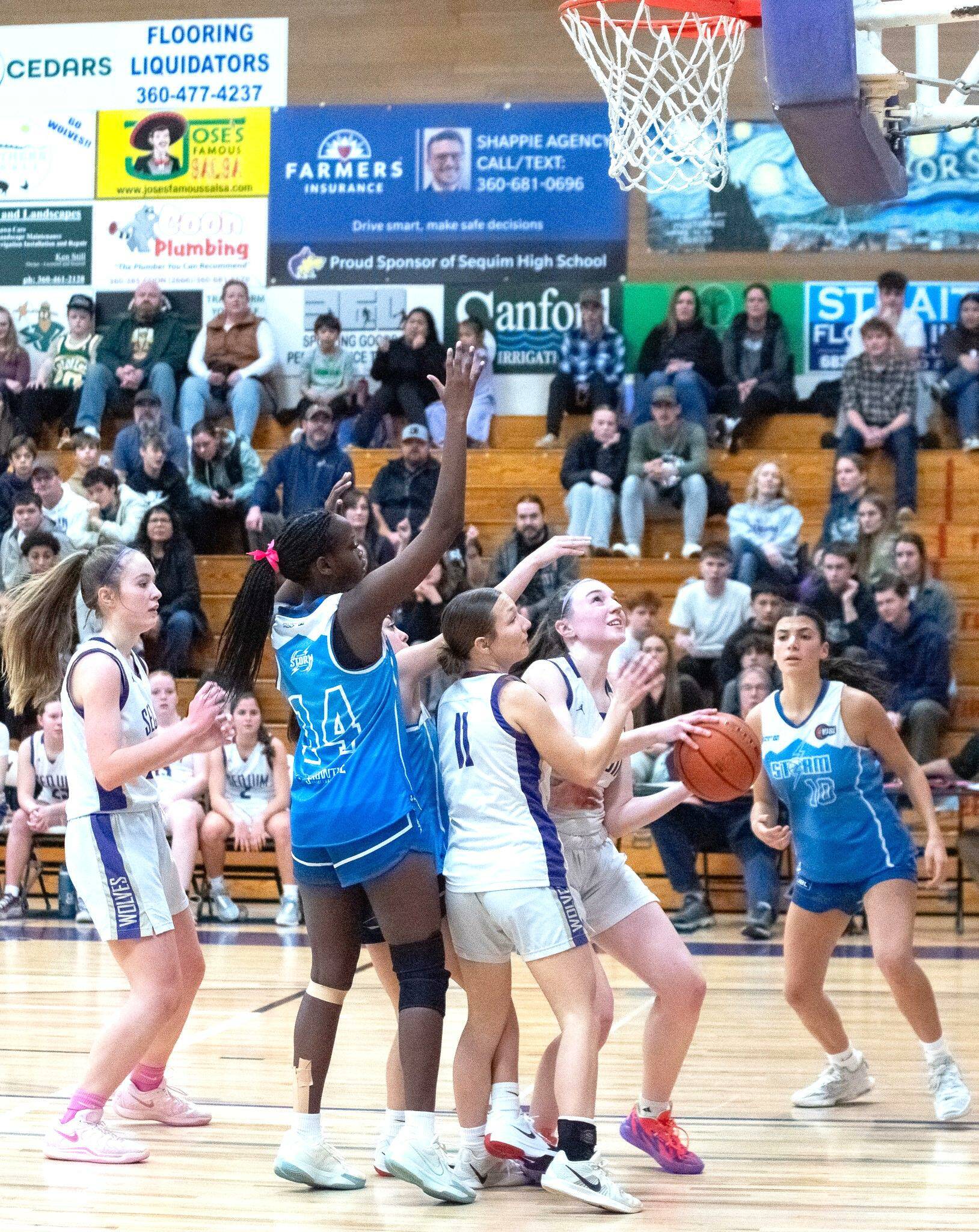 Sequim Gazette photo by Emily Matthiessen/ Sequims Taylor Heyting looks to take a shot against the Bellarine Storm select team from Australia.
