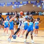 Sequim Gazette photo by Emily Matthiessen
Sequims Gracie Chartraw leans in to shoot over Bellarine Storm select players from Australia on Dec. 30.