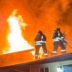 Photo courtesy Beau Sylte, CCFD3
Clallam County Fire District 3 firefighters look to contain a fire in 2024. Calls for fires were down last year, but general calls for service were up from 2023.