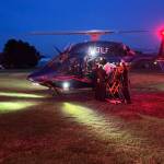 Photo courtesy Beau Sylte, CCFD3/ Clallam County Fire District 3 firefighters/medics bring a patient to Life Flight Network staff in Dungeness for transport out of the area at an undisclosed time. Staff said flights are often needed to bring specific care to patients quicker than by grand transport.
