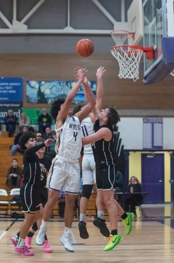 Sequim Gazette photo by Emily Matthiessen/ Sequims Jericho Julmist battles for a rebound during a Jan. 10th game against North Kitsap.