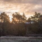 Sequim Gazette photo by Emily Matthiessen/ The sun peeks through the clouds opposite to where it causes a partial rainbow on Fri. Jan. 10.