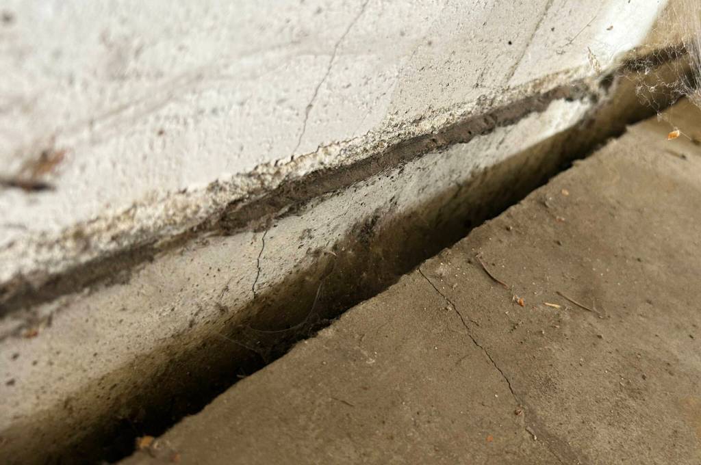 Sequim Gazette photo by Matthew Nash/ One wall in the Transportation Centers repair shop continues to spread from the floor and crack in many spots.