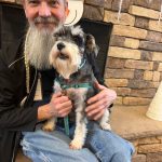 Sequim Gazette photo by Kathy Cruz
Sequim Health and Rehabilitation caregiver Lyndon Crabtree and his Miniature Schnauzer Jazmine are now Certified Animal-Assisted Intervention Professionals (C-AAIP). Crabtree said Jazmine has a calming effect on residents.