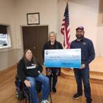 Bonnie Richardson, left, and E.R. Klayton Waldron, right, present a check for $6,000 to Sequim Food Bank Executive Director Andra Smith. Richardson procured the funds by submitting for a grant from Elks National Foundation (ENF). The money was used to help fill 850 bags for the food banks Family Holiday Meal Program.
Photos courtesy of Sequim Elks Lodge #2642