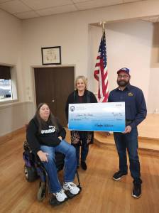 Bonnie Richardson, left, and E.R. Klayton Waldron, right, present a check for $6,000 to Sequim Food Bank Executive Director Andra Smith. Richardson procured the funds by submitting for a grant from Elks National Foundation (ENF). The money was used to help fill 850 bags for the food banks Family Holiday Meal Program.
Photos courtesy of Sequim Elks Lodge #2642