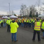 Volunteers gather at Carrie Blake Park on Dec. 20 to distribute food for the Sequim Food Banks Family Holiday Meal Program with some funding for items procured by Bonnie Richardson of Sequim Elks Lodge #2642 through a grant.