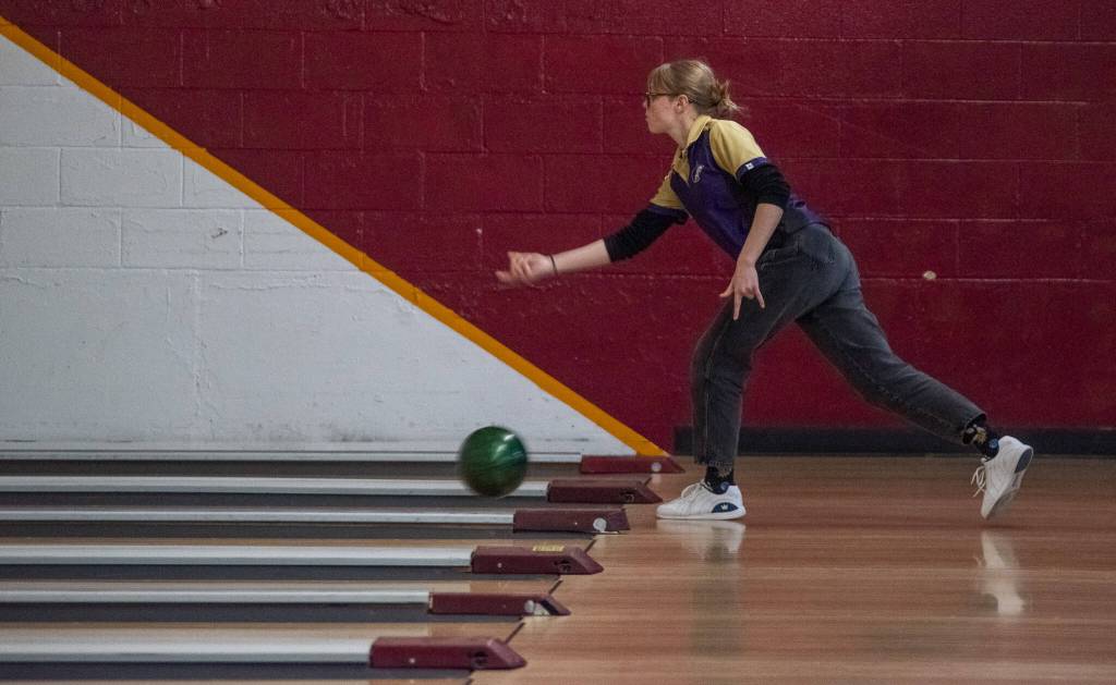 Sequim Gazette photo by Emily Matthiessen/ Kimberly Heintz bowls for the Wolves during their last regular game on Thursday at Laurel Lanes in Port Angeles.