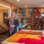 Sequim Gazette photo by Emily Matthiessen
Sequim artist Lora Armstrongs wet studio contains machines to help with felting and a fraction of the colorful art pieces she produces.
