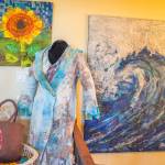 Sequim Gazette photo by Emily Matthiessen
Felter Lora Armstrongs pieces are varied. They include giant pieces attached to canvas, like the wave shown here, and clothing pieces that involve the intricacies of eco-dying, nuno-felting and silk roses.