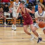 Sequim Gazette photo by Emily Mathiessen/ Sequims Zeke Schmadeke goes up for a shot against Kingston on Jan. 17.