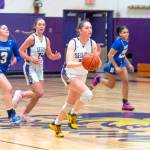 Sequim Gazette photo by Emily Matthiessen/ Libby Turella brings the ball up court against Bremerton on Jan. 14.