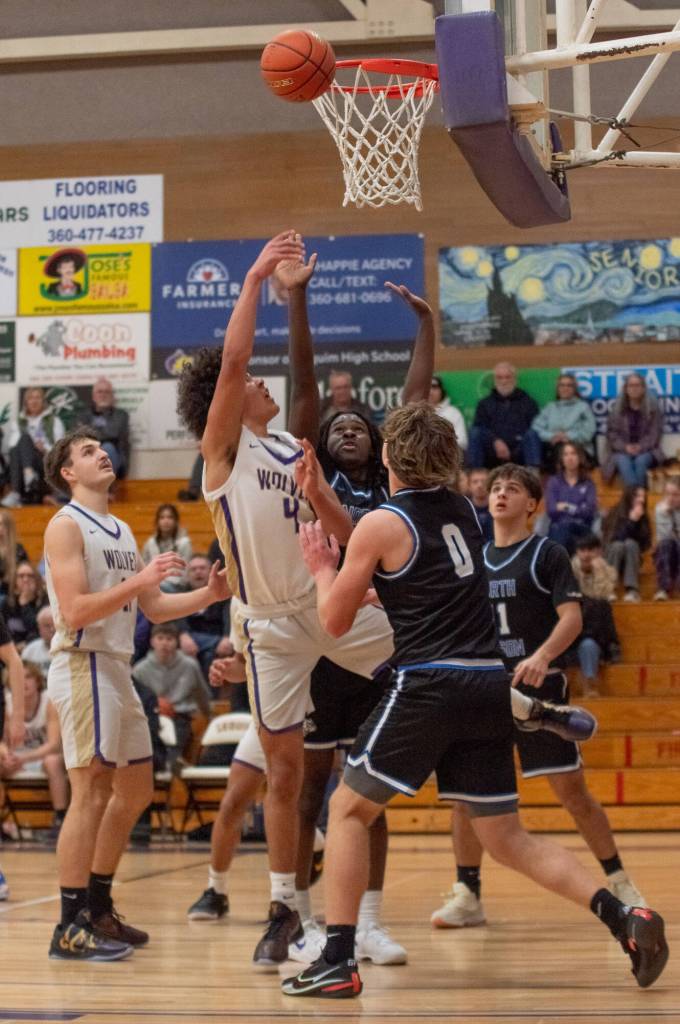 Sequim Gazette photo by Emily Matthiessen/ Jericho Julmist adds to his game high 26 points against North Mason in a 63-48 win.
