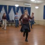 Sequim Gazette photo by Emily Matthiessen/ Sequim Ballroom intern Brie Rocha leads the Swing class in steps.