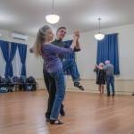 Sequim Gazette photos by Emily Matthiessen
Competitive dance champion and ballroom dance instructor Werner Figar leads student Debra Van Dusen in a waltz, while other students circle the room at Old Dungeness Schoolhouse.