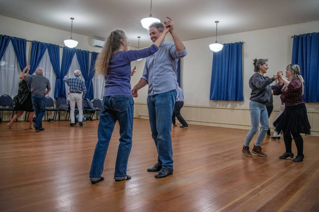 Sequim Gazette photo by Emily Matthiessen/ Sequim Ballroom students Debra Van Dusen and Philip Wade practice a waltz together.