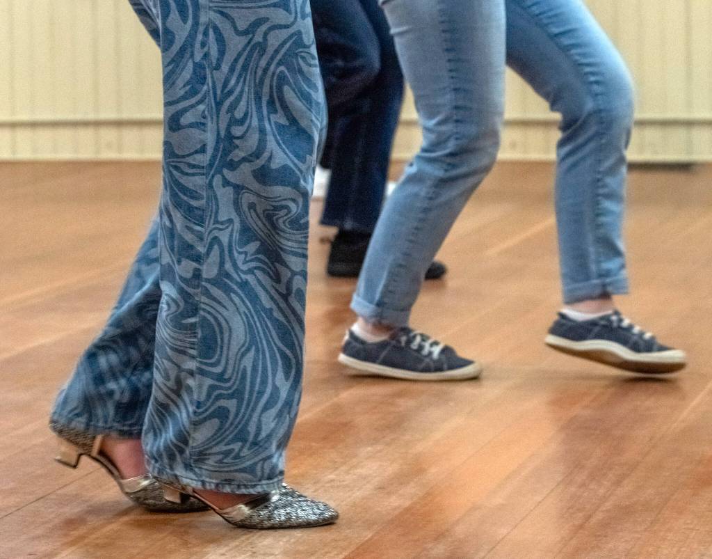 Sequim Gazette photo by Emily Matthiessen/ At the Old Dungeness Schoolhouse people danced the Salsa last Thursday evening during a Sequim Ballroom dance lesson.