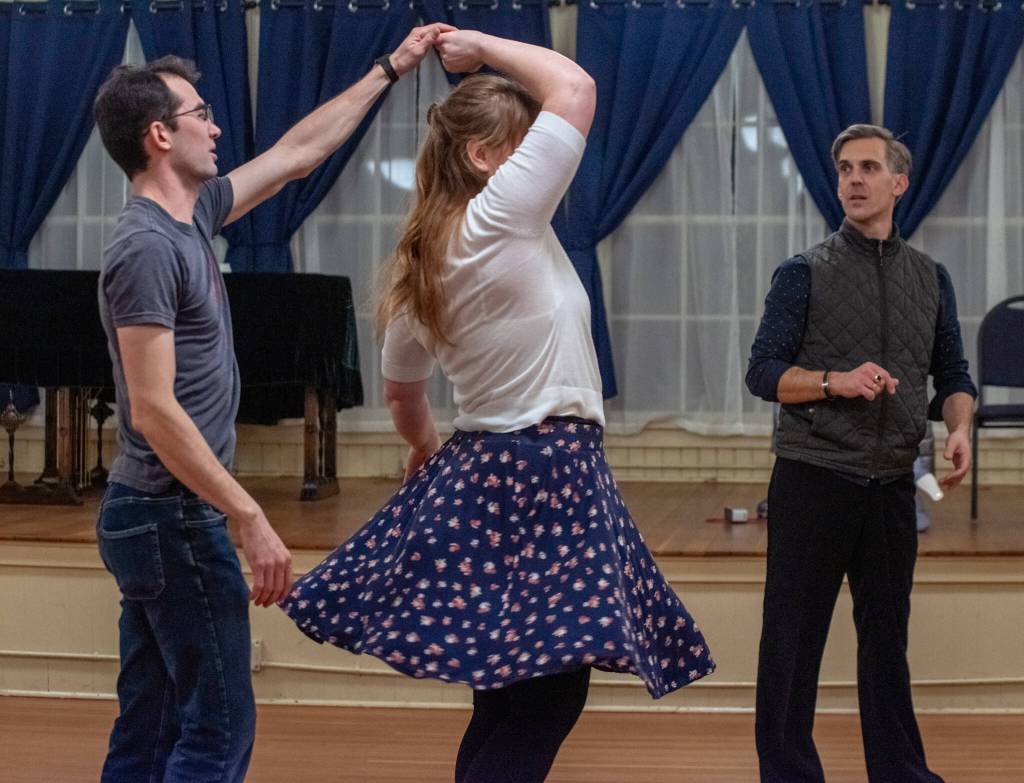 Ballroom dance instructor Werner Figar, right, helps dancers Dean Hennen and Desirae Cortez with their Salsa form during a recent intermediate/advanced class at Sequim Ballroom.