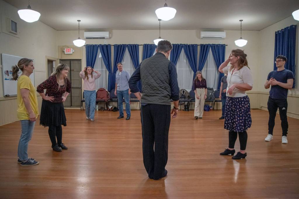Sequim Gazette photo by Emily Matthiessen/ Sequim Ballroom students take a breather after an energetic Swing practice.