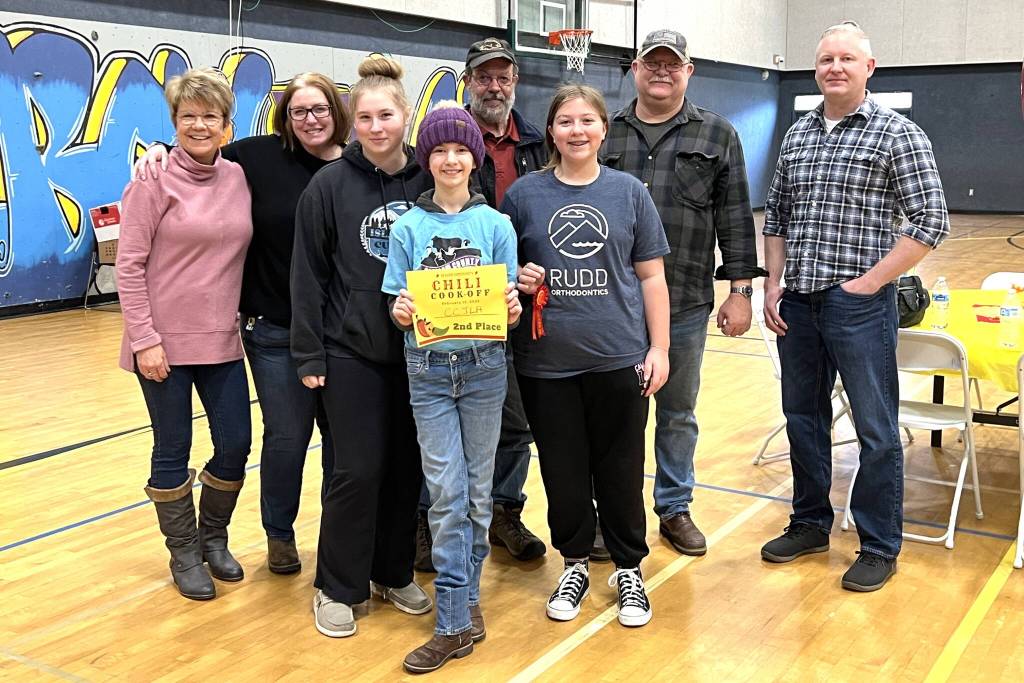 Below: Members of the Clallam County Junior Livestock Auction, pictured with judges, won second place for $300 for the organization at the Community Chili Cookoff on Feb. 17.