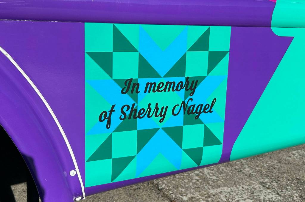 Sequim Gazette photo by Matthew Nash
A new bus at the YMCA of Sequim is dedicated to late board member Sherry Nagel who died in July 2024. She donated funds to help fund the bus to help transport seniors and children to activities.